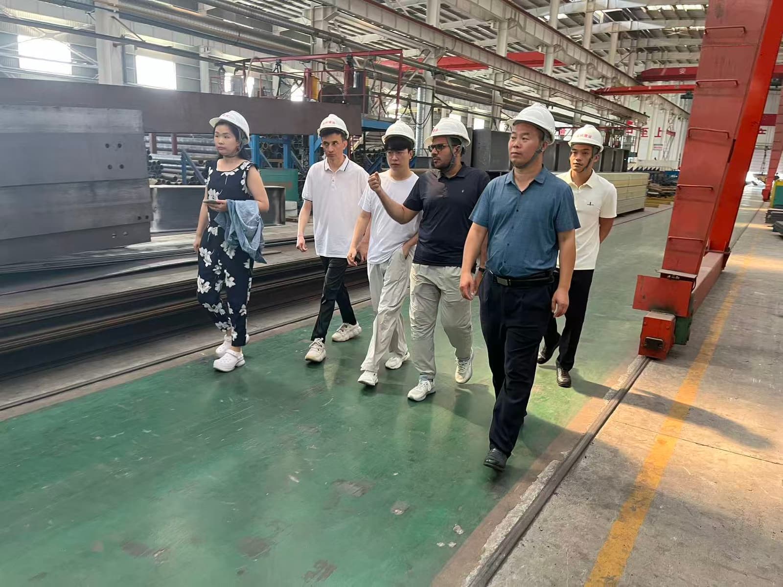 Foreign customer delegation visiting factory workshop